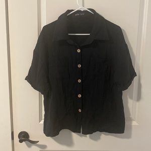 Black button down short sleeve.